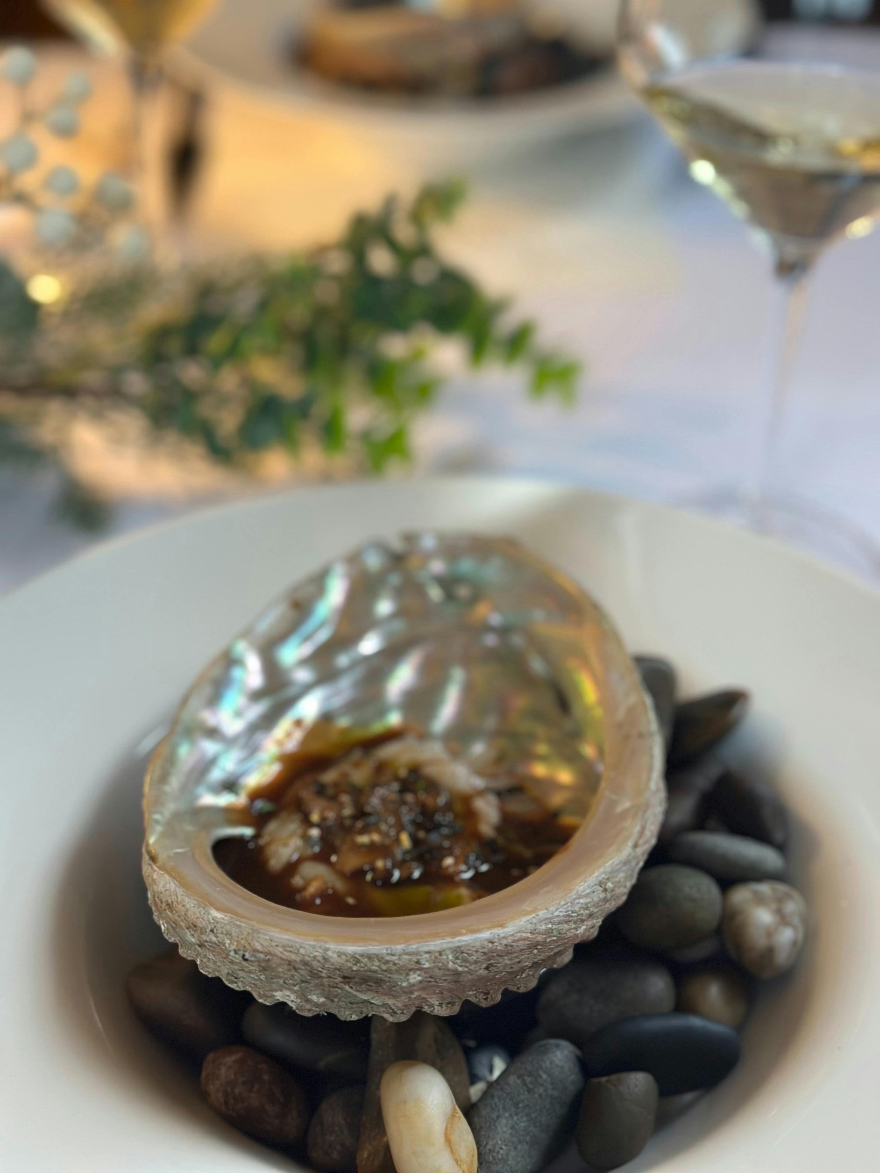 freshly cooked Tasmanian abalone with a savoury dressing