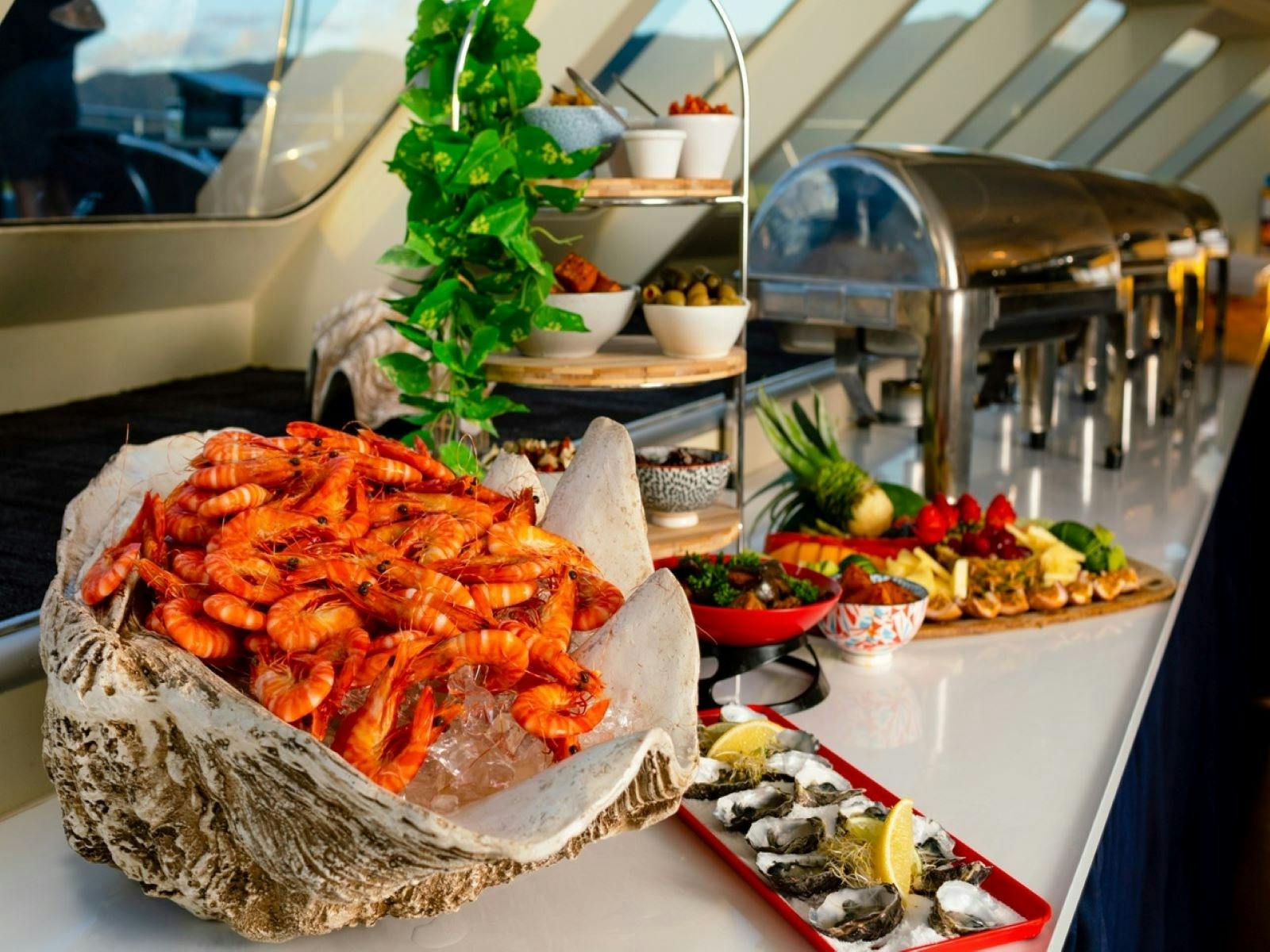 Buffet layout including local produce and fresh seafood
