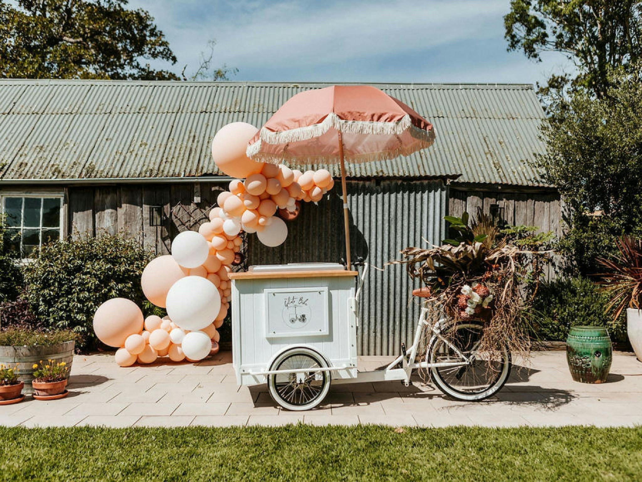 The Gelato Bike with our coral umbrella