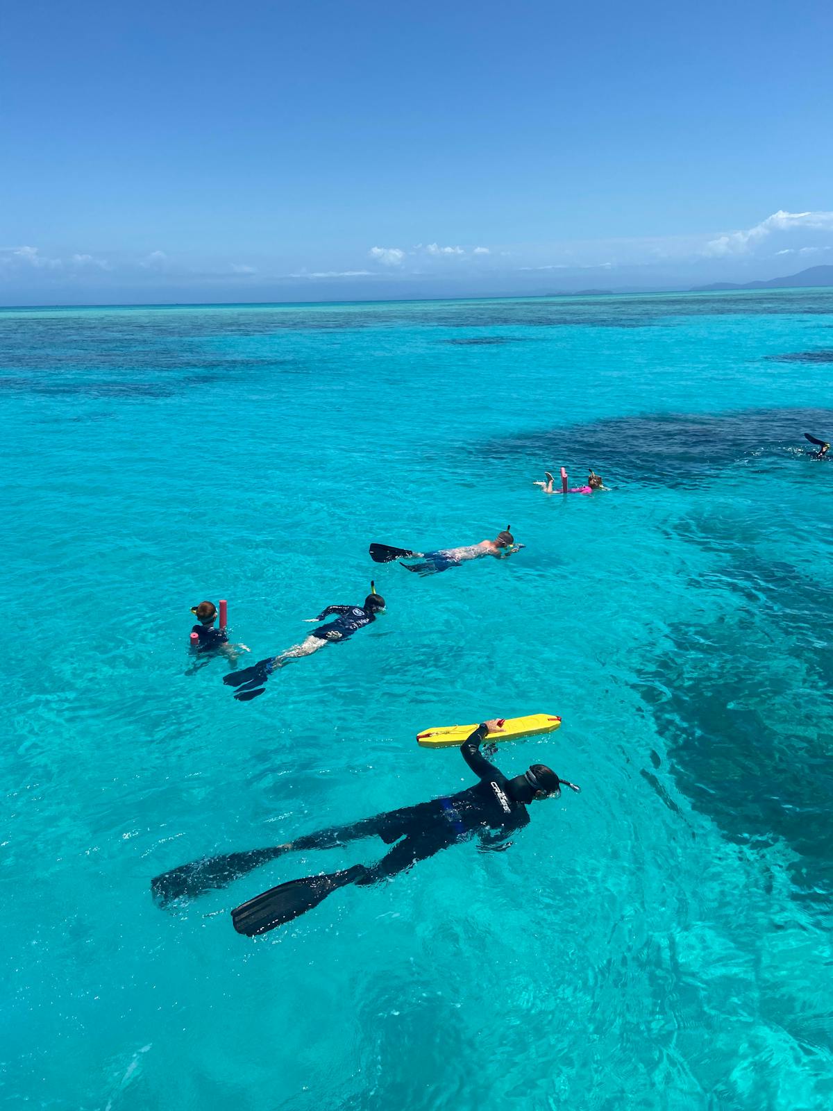 Tiny snorkel group guided by marine biologist