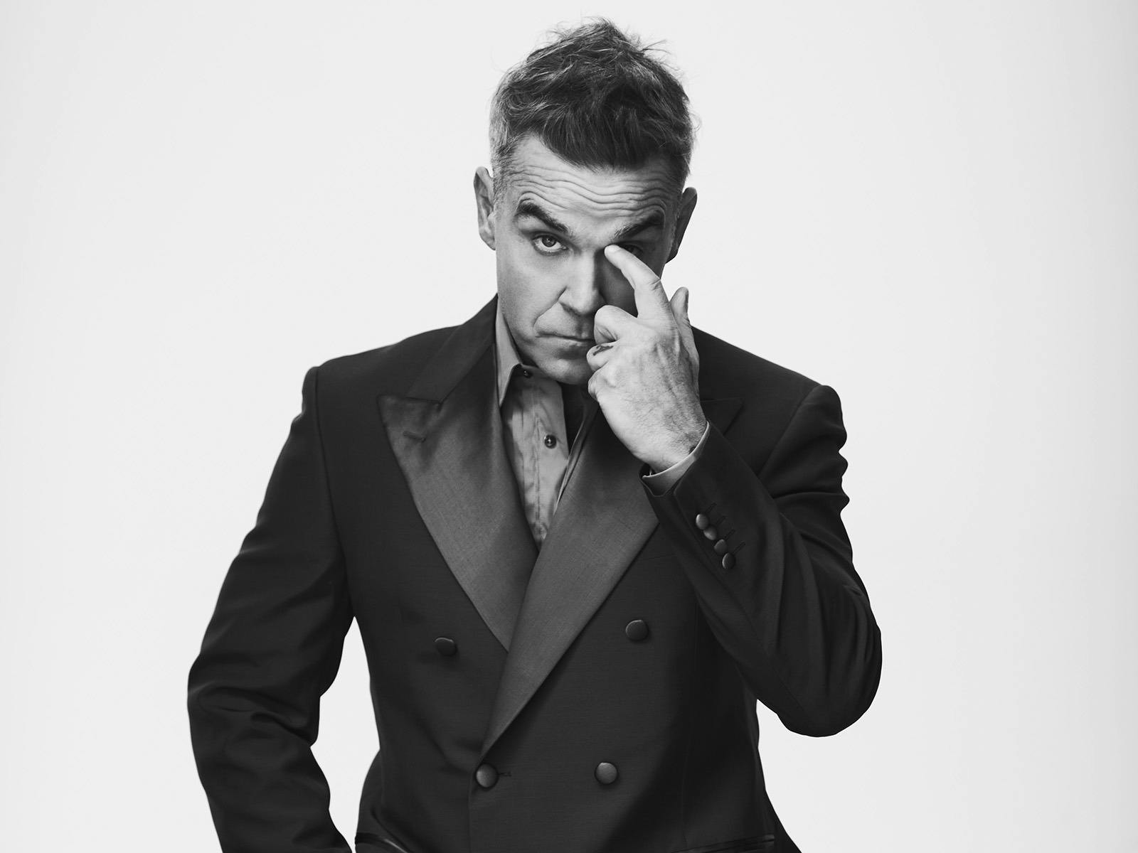 A press image of Robbie Williams