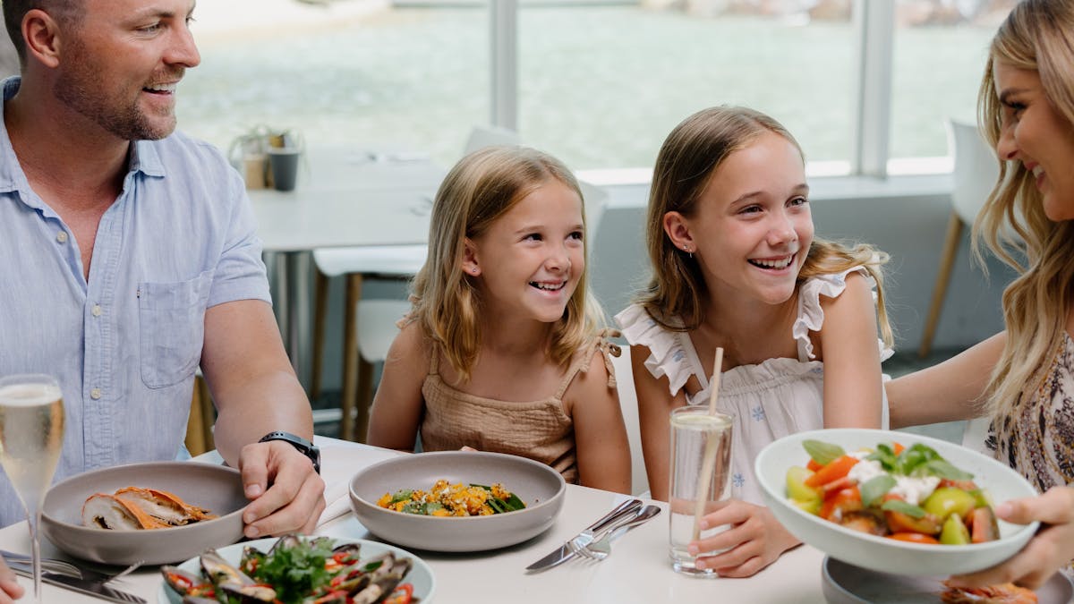 Family enjoying Seafood Buffet at Terraces Restaurant