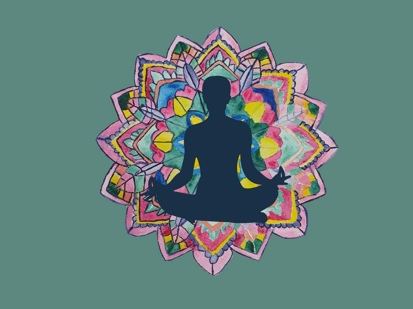 Painted mandala with a silhouette of a seated yoga pose.