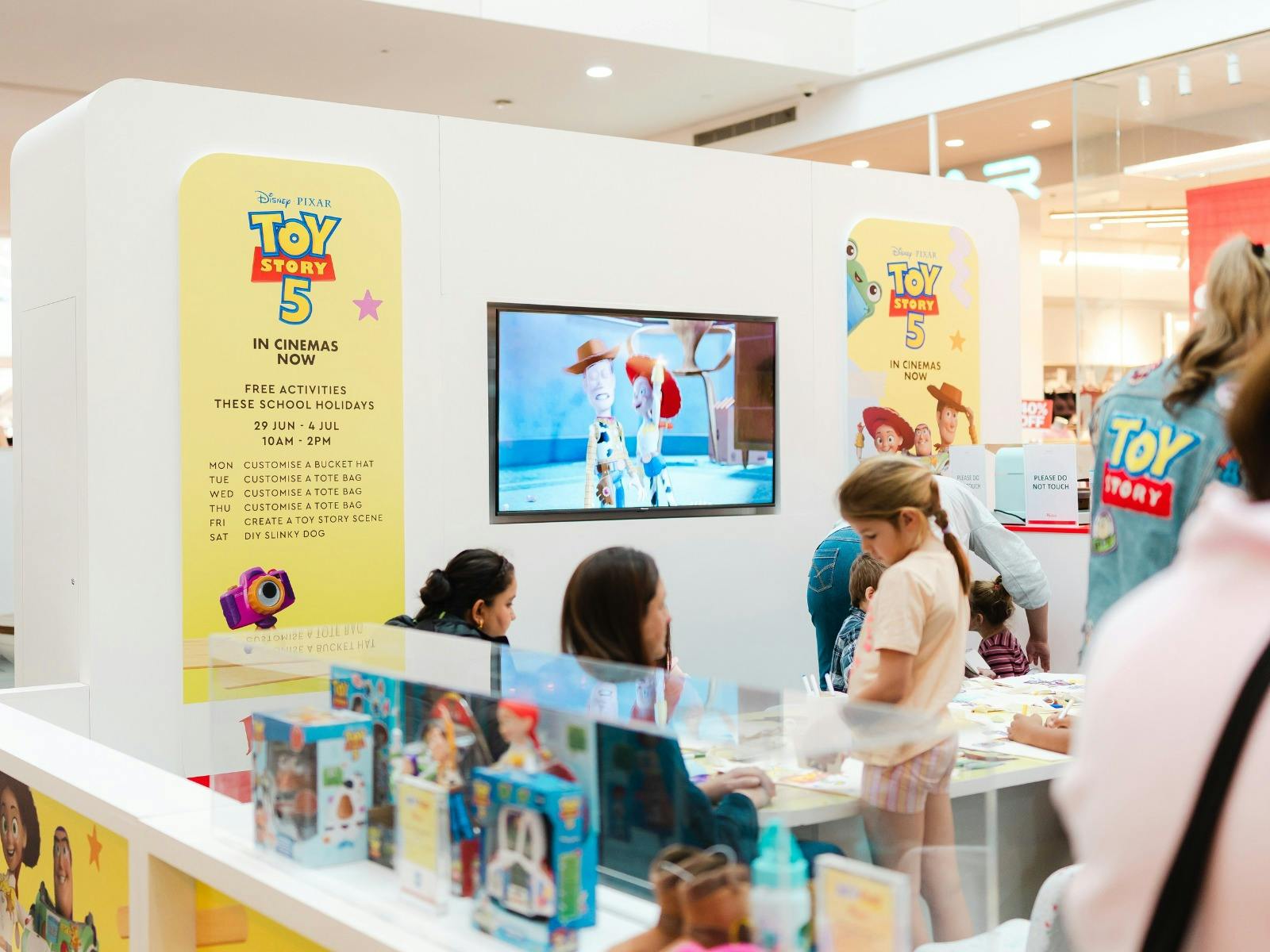 side view of the Activity Station with Toy Story playing on the screen