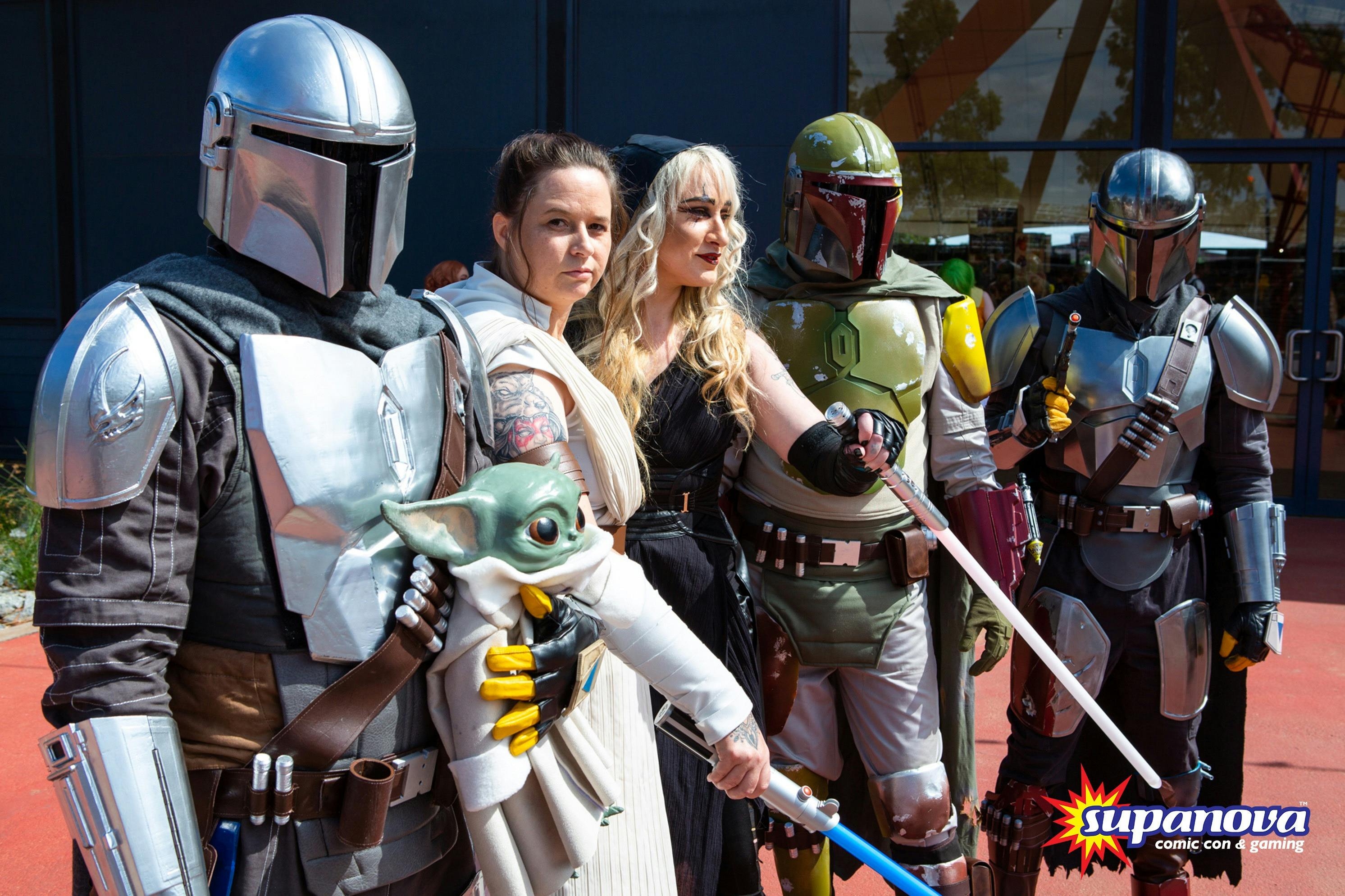 Group of Star Wars cosplayers posing together.