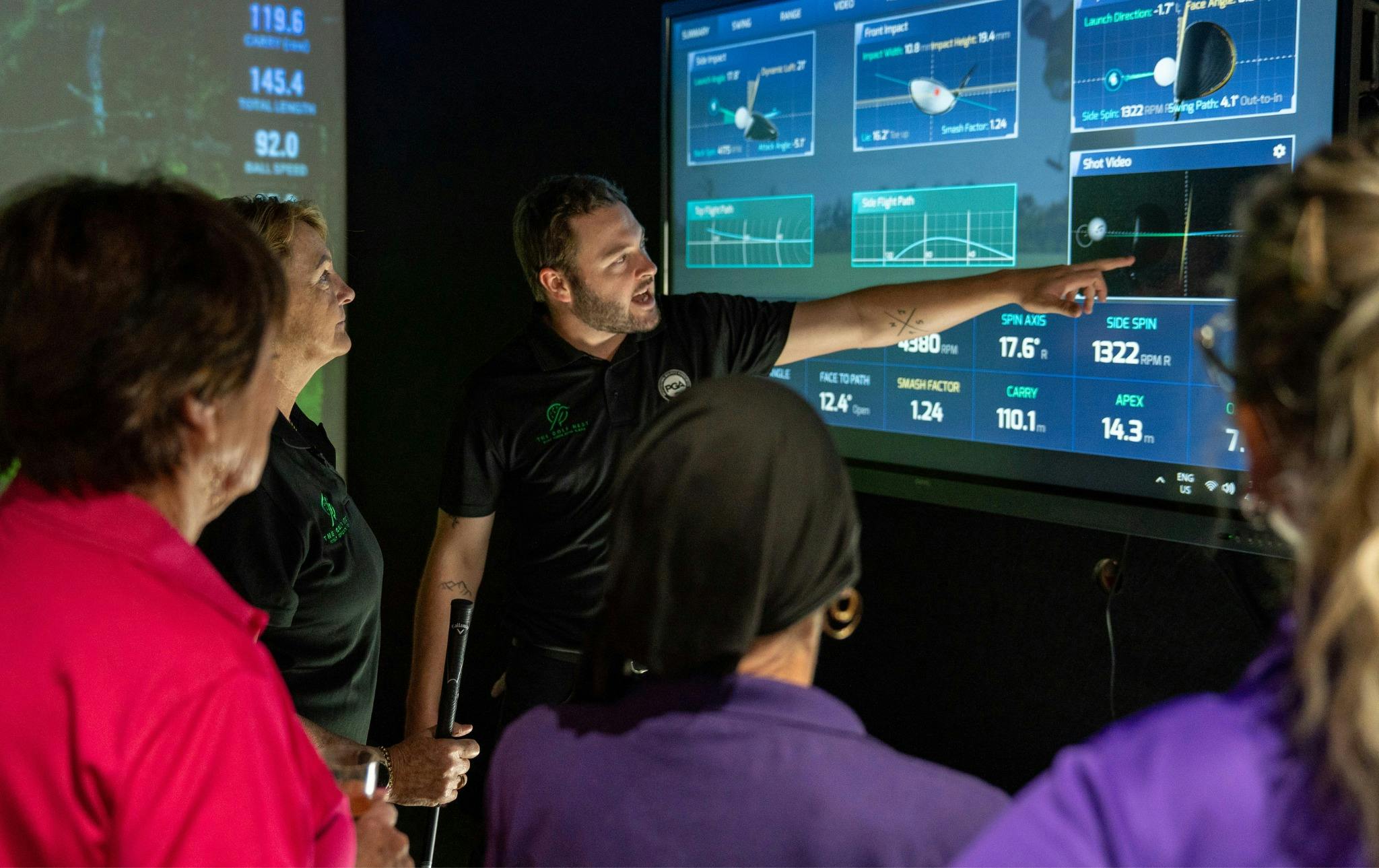 Coach explaining the sim data