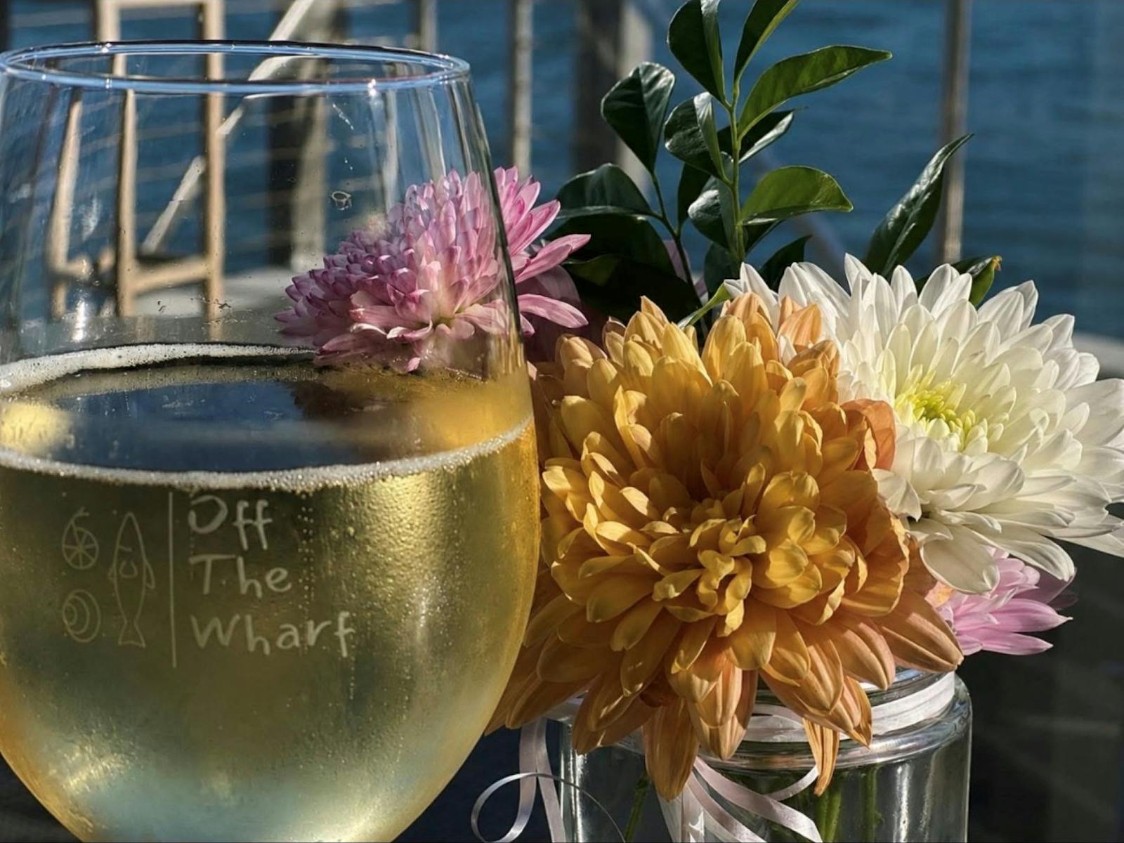 Glass of wine and flowers