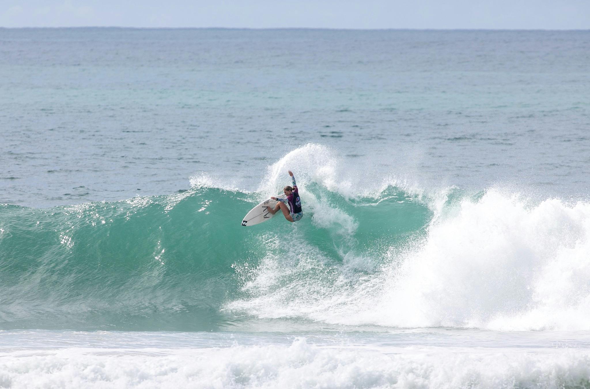 female surfing