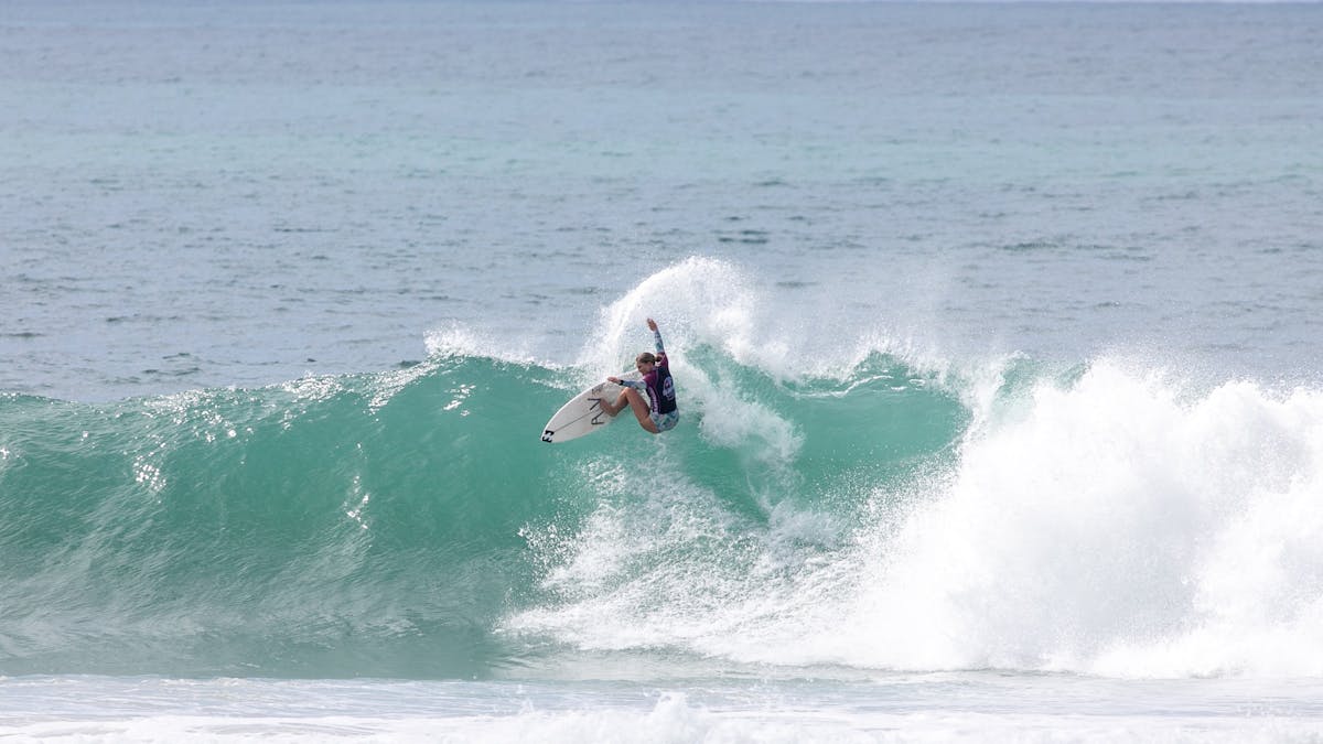 female surfing