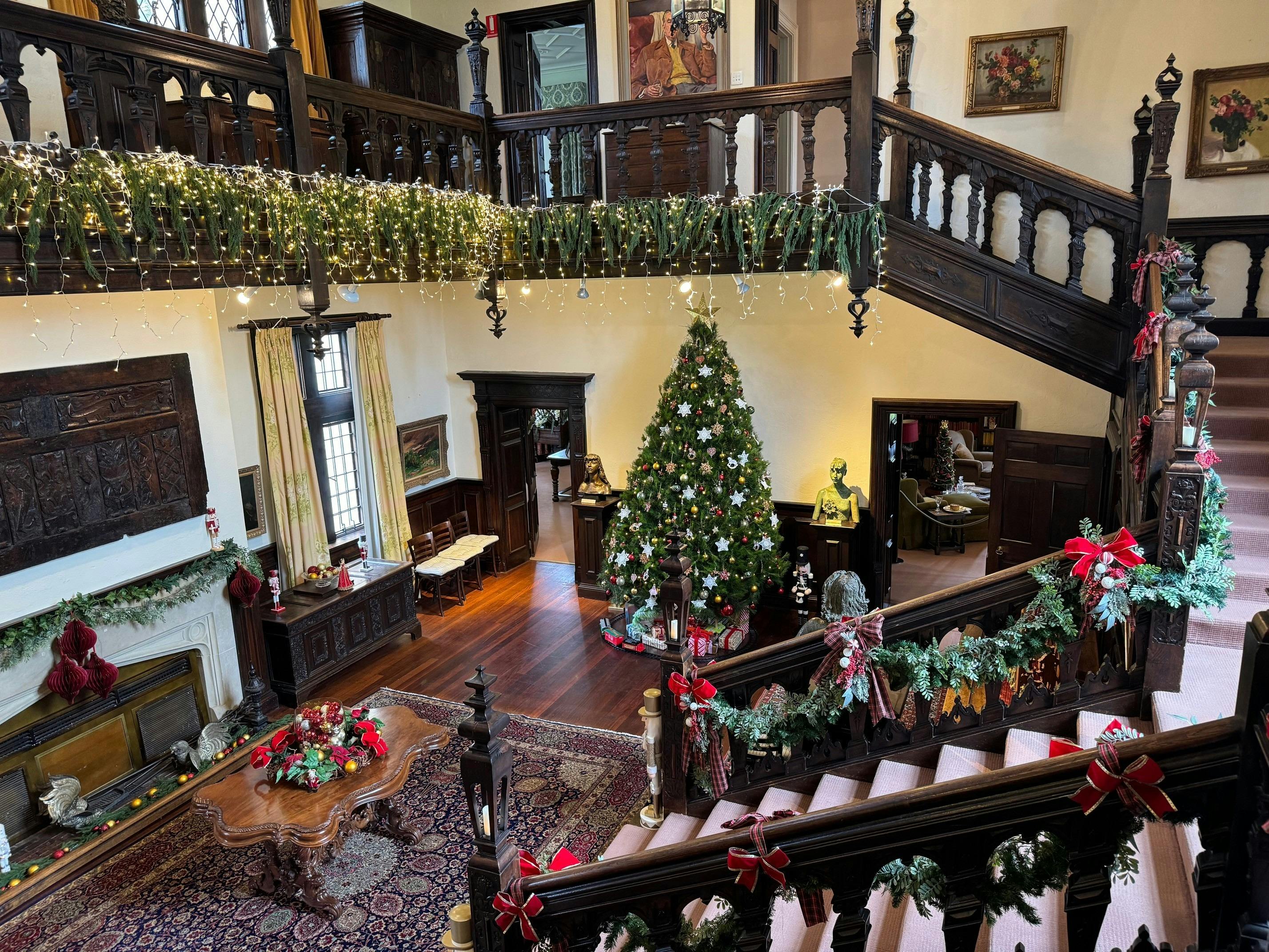 great hall decorated with traditional Christmas themes