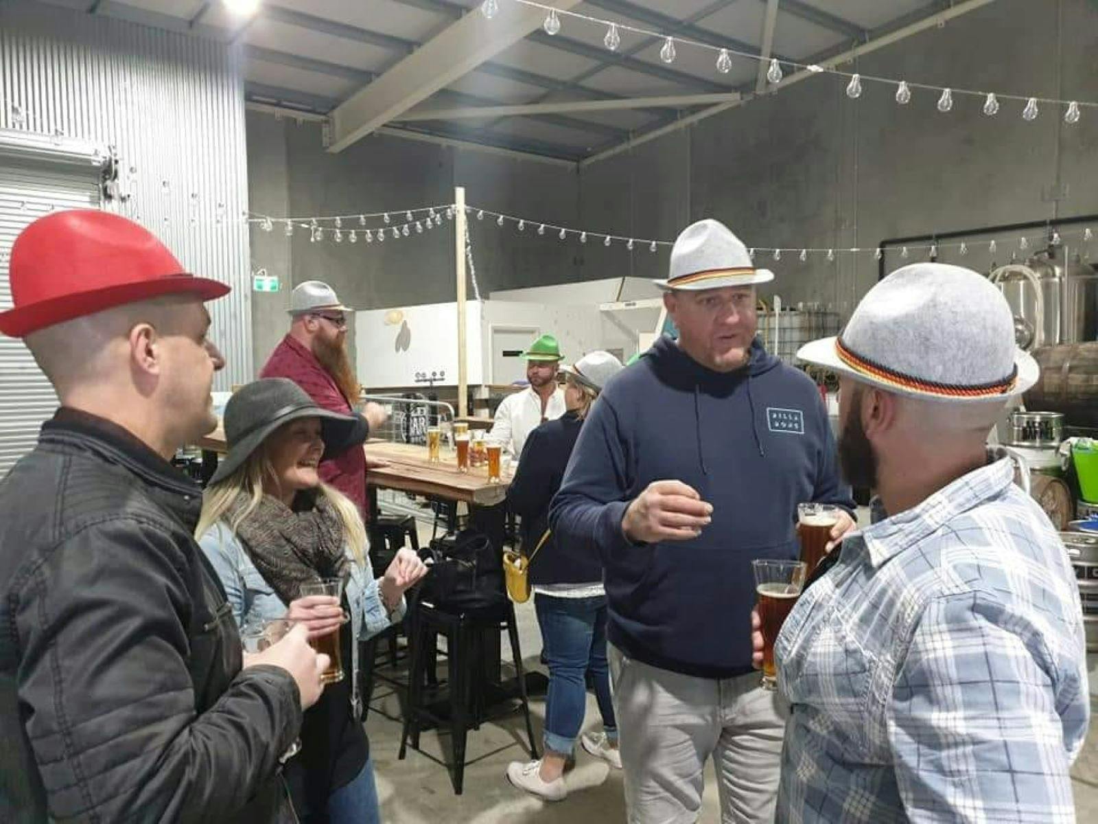 Guests drinking in distillery