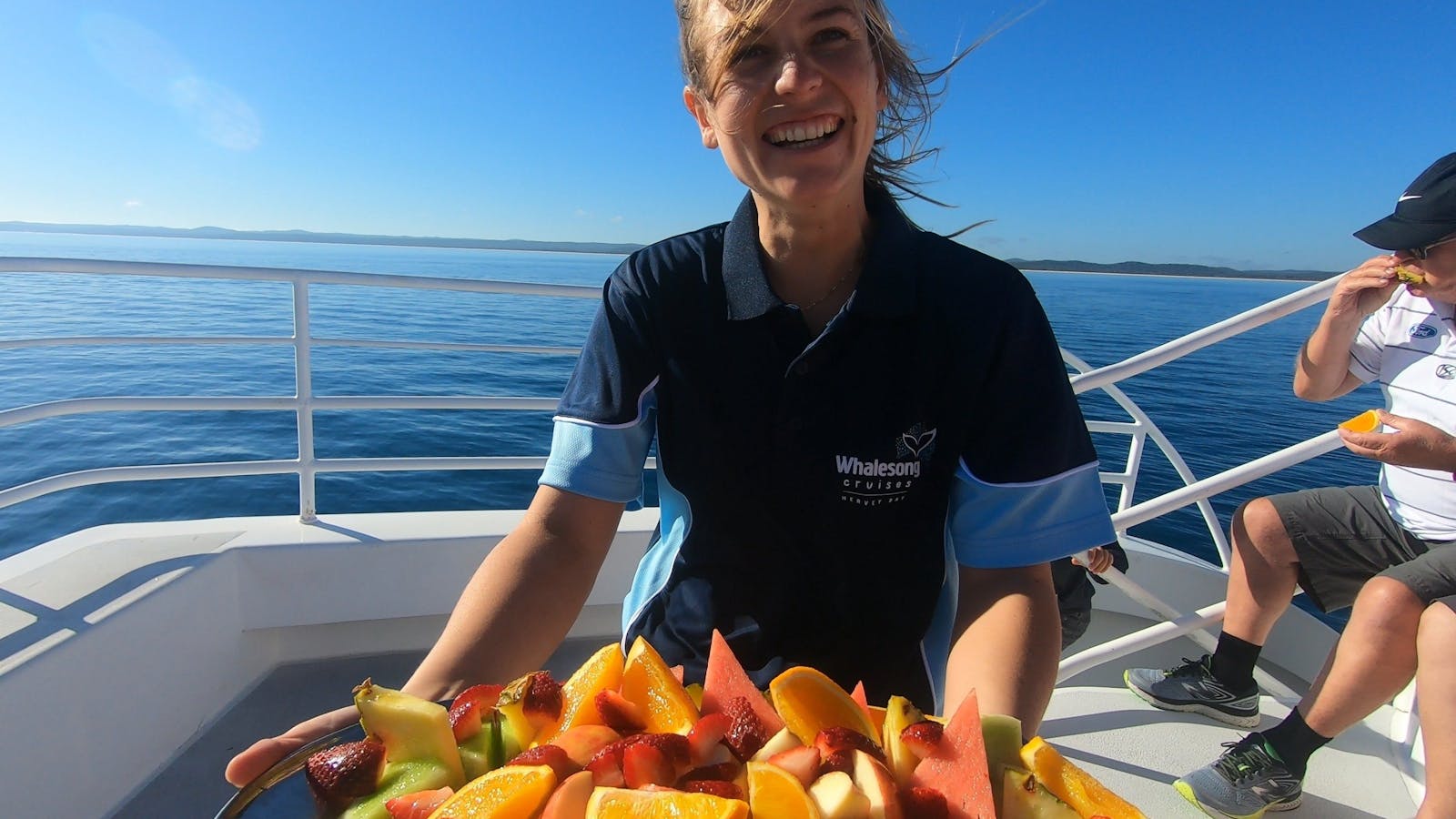 Fresh fruit platter served with a variety of cakes for morning tea onboard Whalesong Cruises