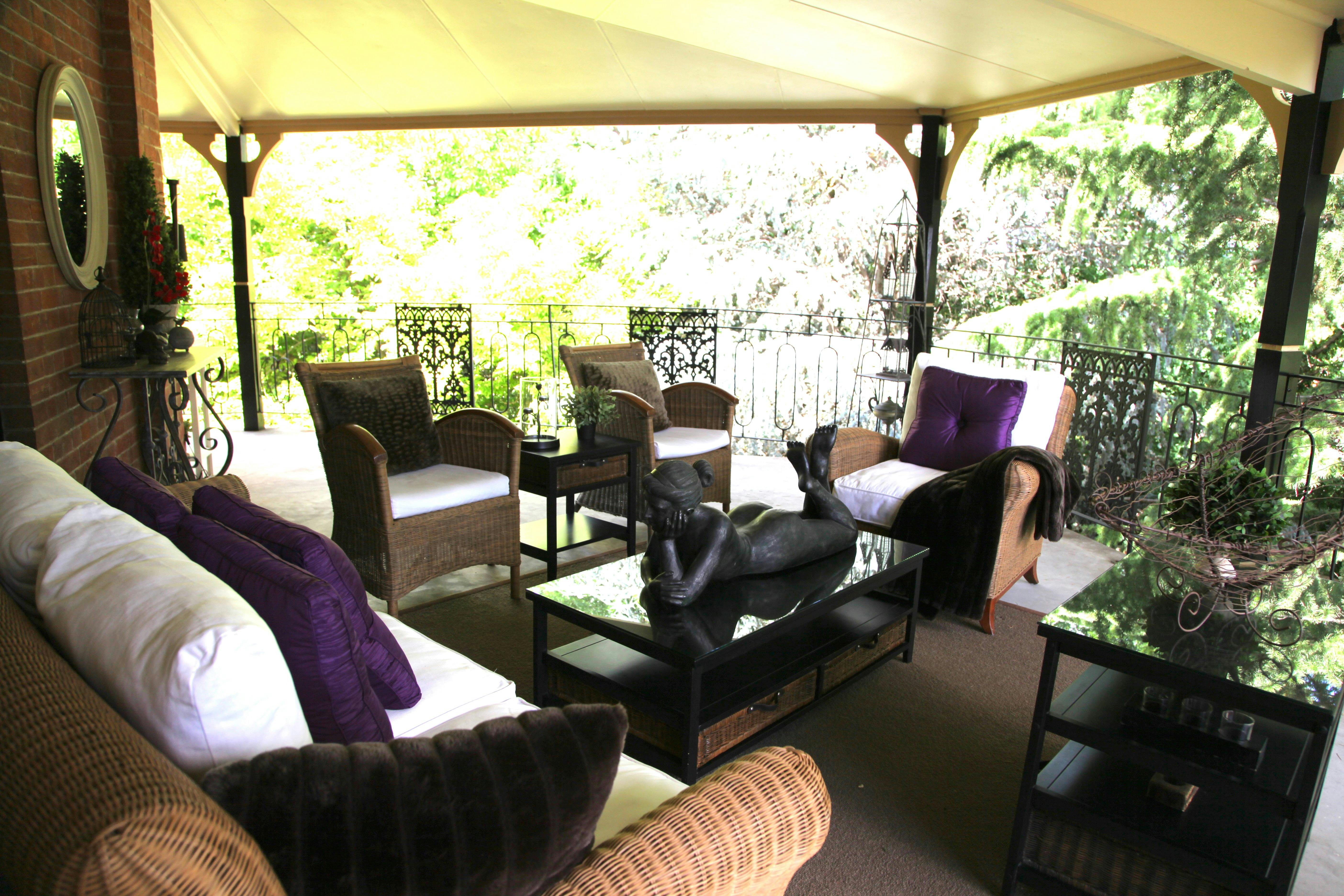 Upper outdoor terrace lounge room in tree level , perfect for an evening drink or morning coffee