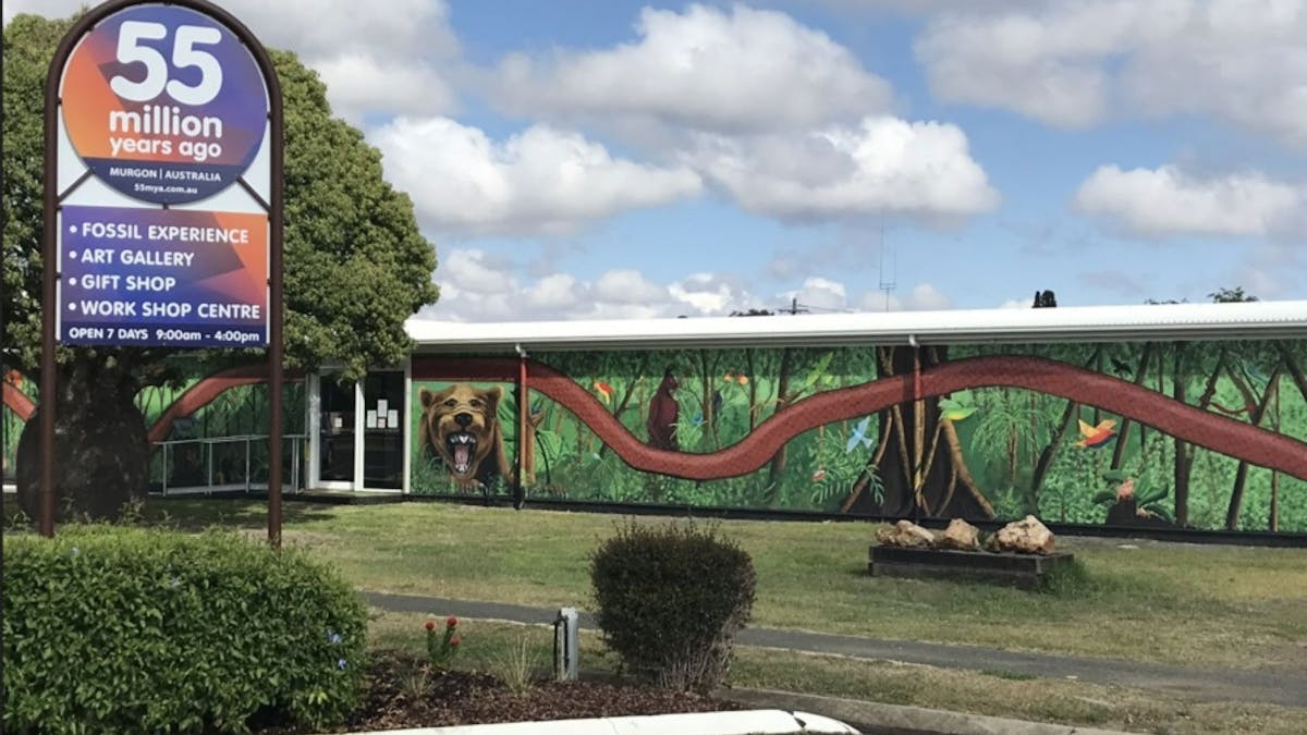 Large murals are located on the front walls of the building. Large murals are located on the front walls of the building.