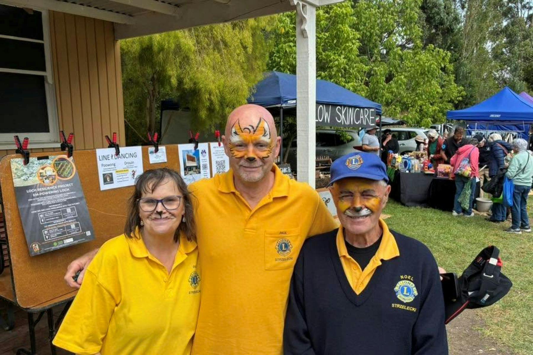 Lion's Committee painted faces