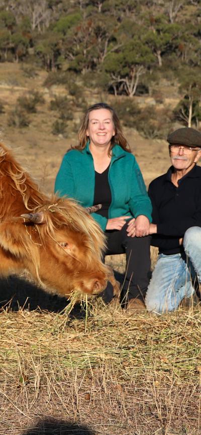 Anne And Graeme with highland cow