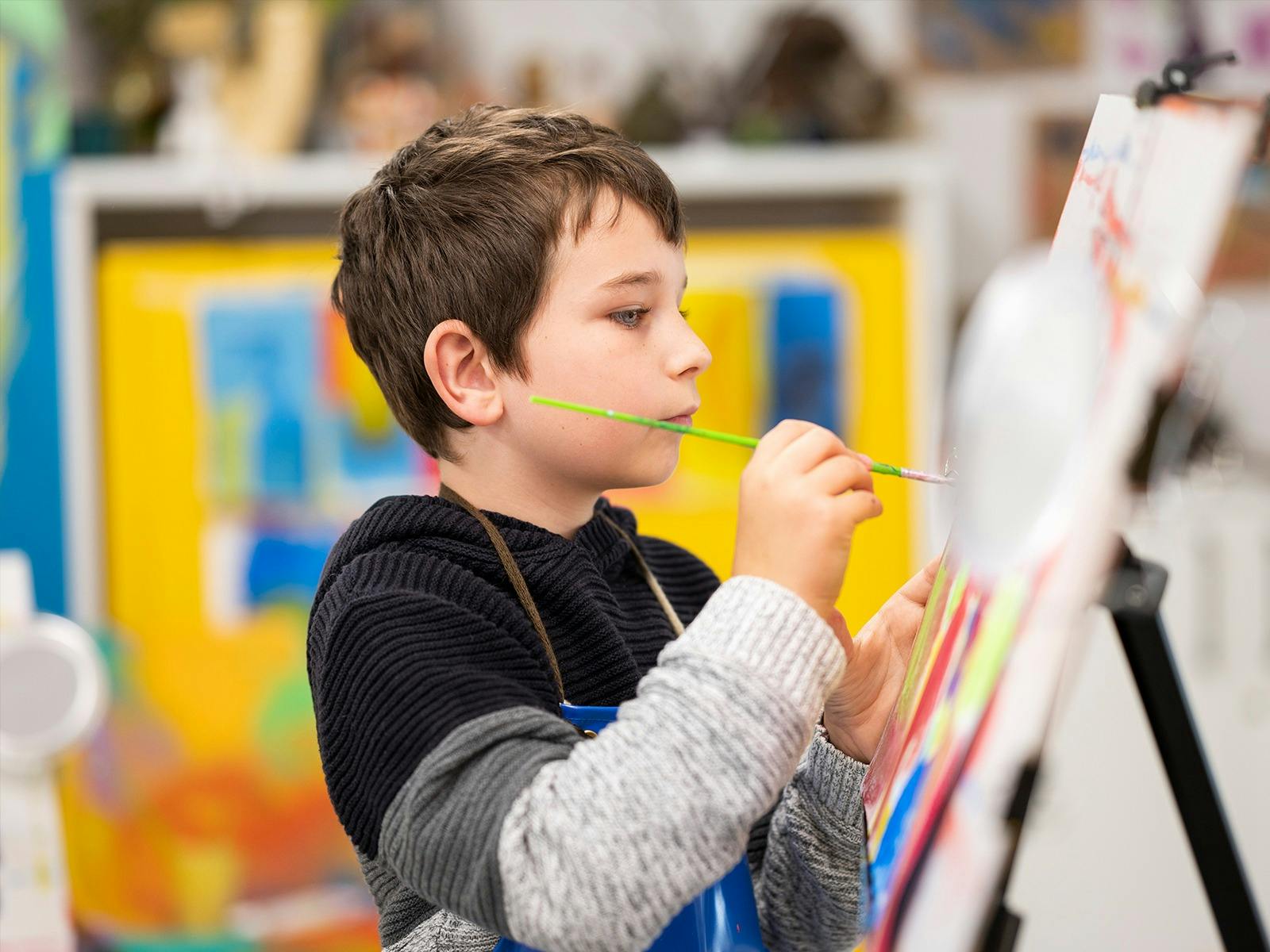Kid painting at Tuggeranong Arts Centre