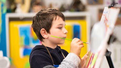 Kid painting at Tuggeranong Arts Centre