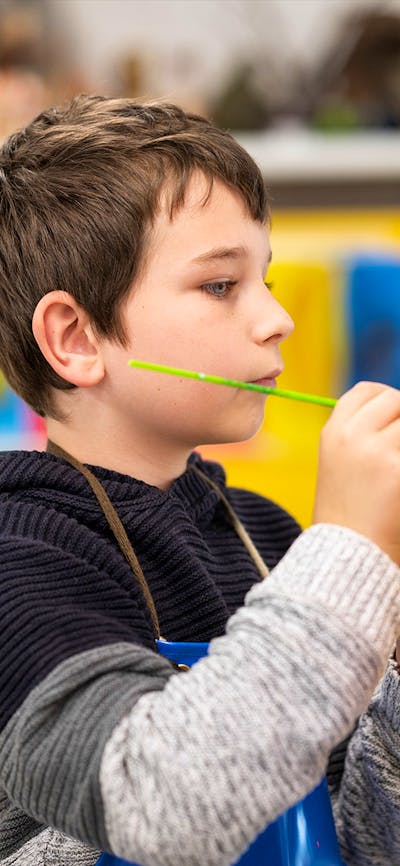 Kid painting at Tuggeranong Arts Centre