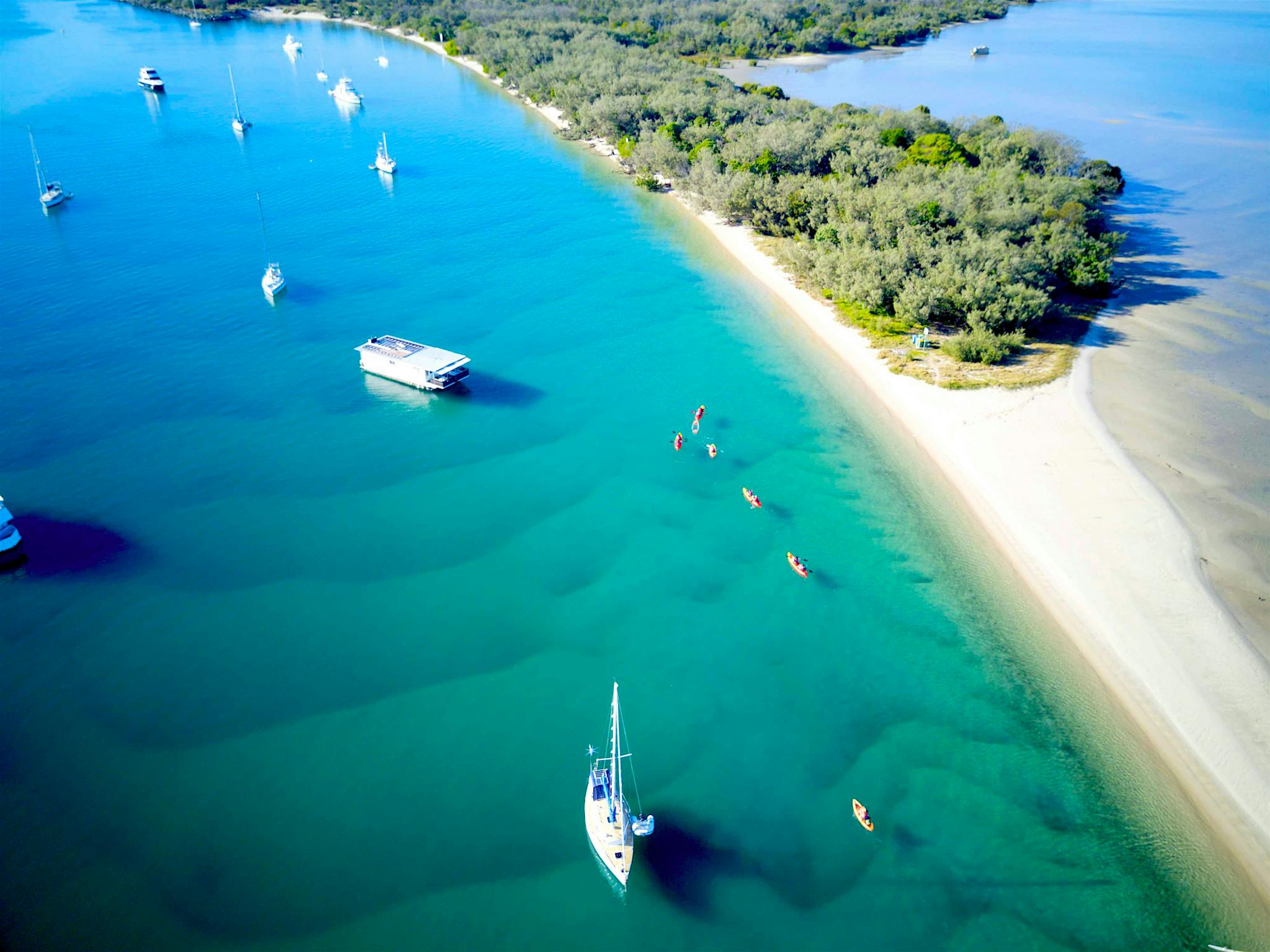 Kayaking though the crystal waters of Wave break Island, Gold Coast Kayaking though the crystal waters of Wave break Island, Gold Coast