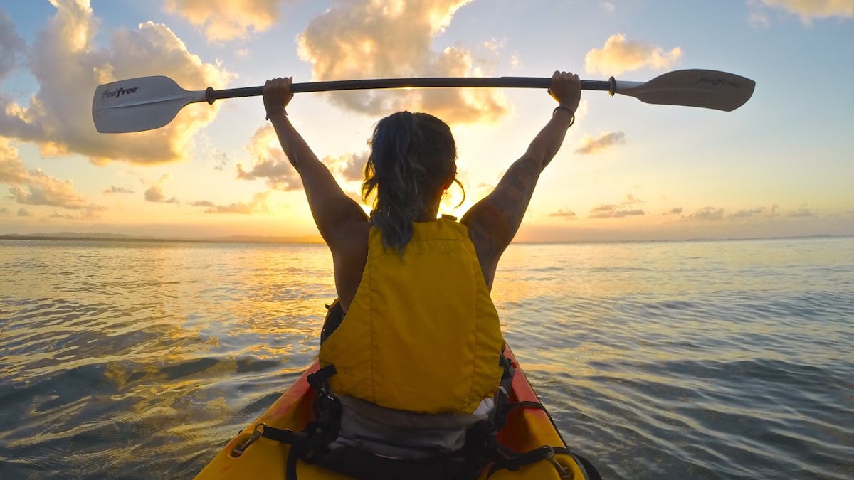Watching an ocean sunset from a kayak