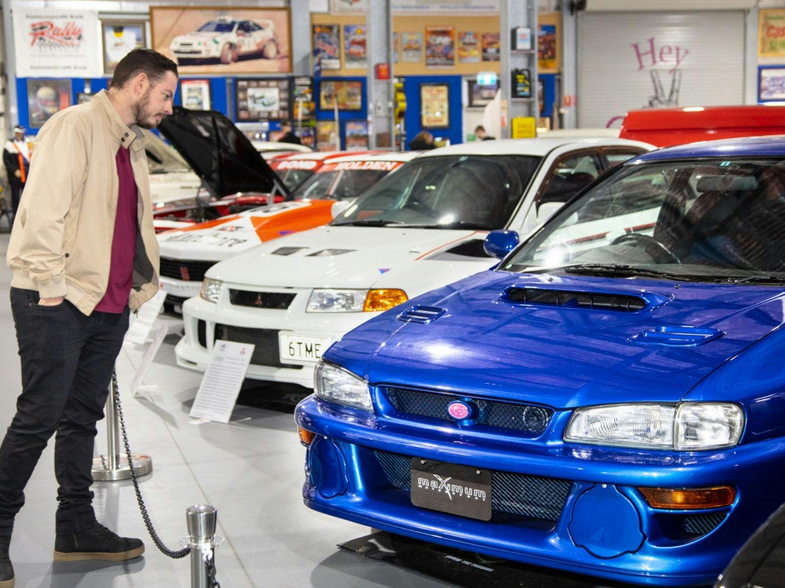 Man looking at the Subaru 22B STi