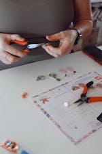 a lady making earrings