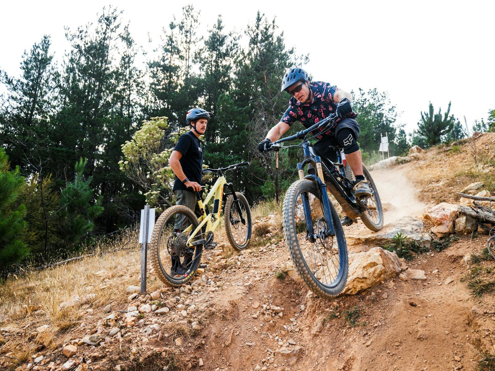 MTB rider going down technical feature on bike in Bright Victoria Mystic Bike Park