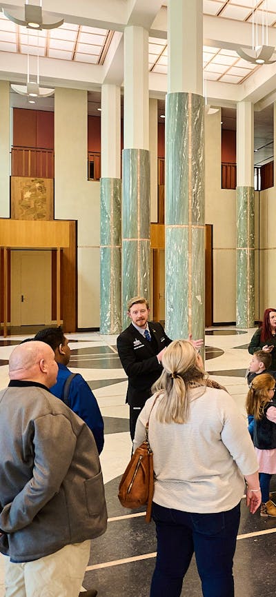 People during a tour in the Marble Foyer of Parliament House