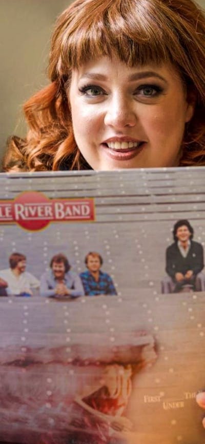 Lady looking at an album