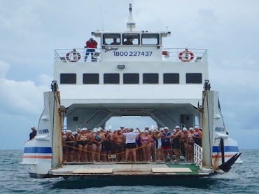 Swimmers about to hit the water in the 2017 event Swimmers about to hit the water in the 2017 event