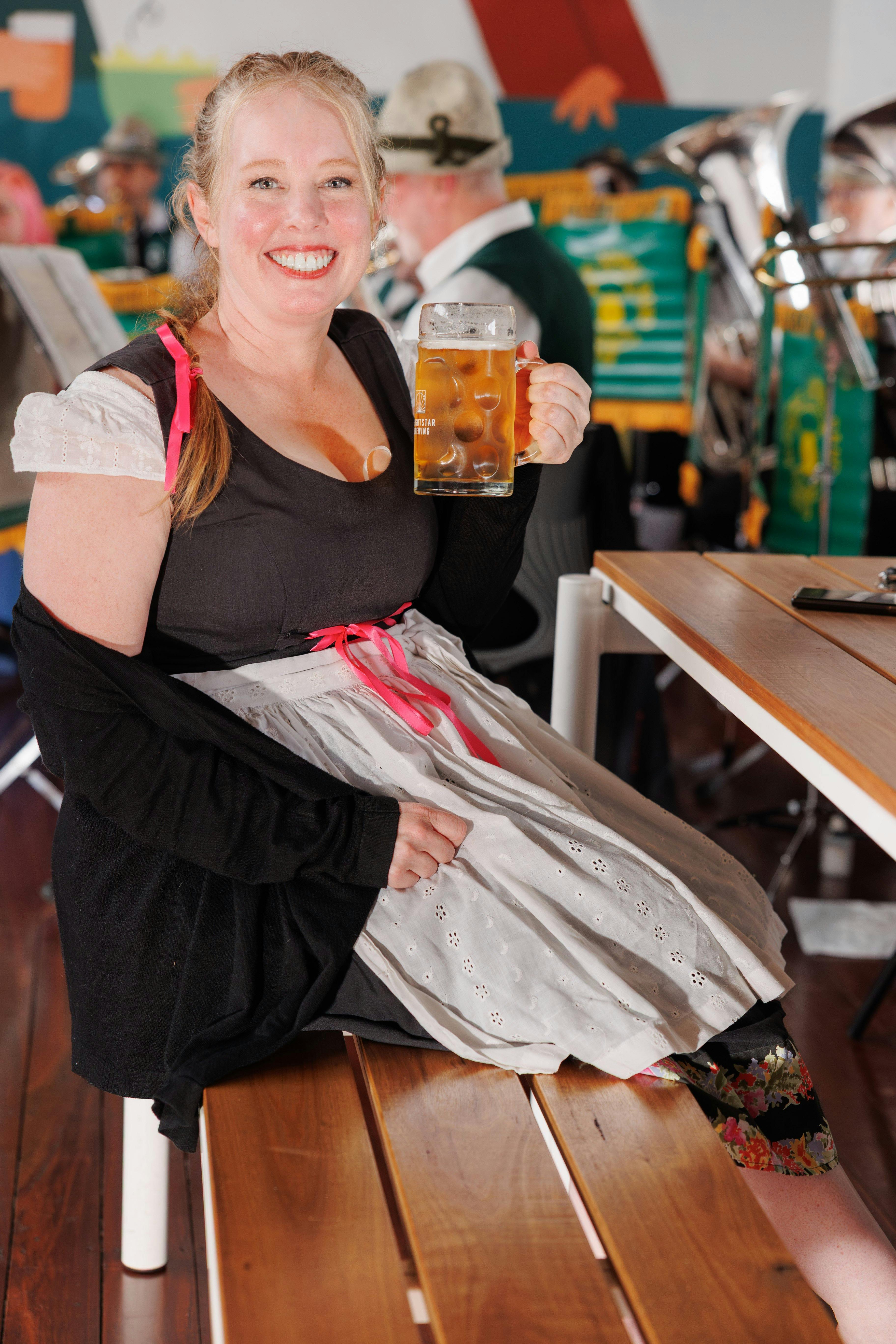 Lady holding a beer glass