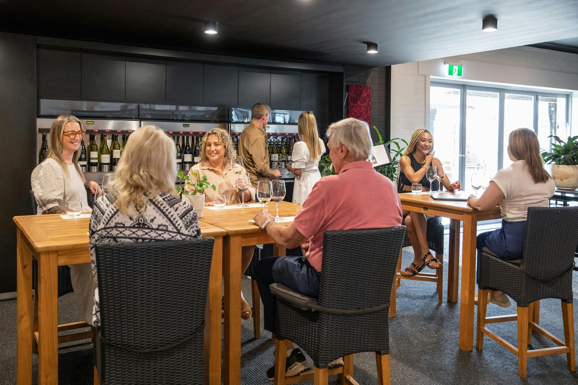 Group of people enjoying wine tasting experience