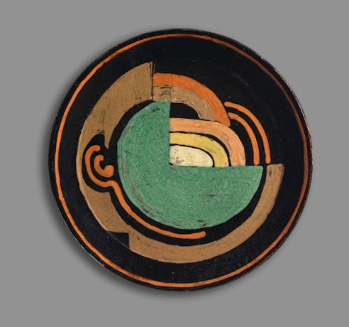 A colourful cubist handmade plate