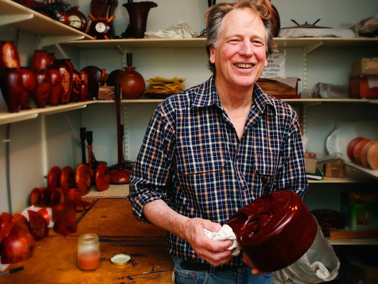 Wood worker with hand crafted pieces