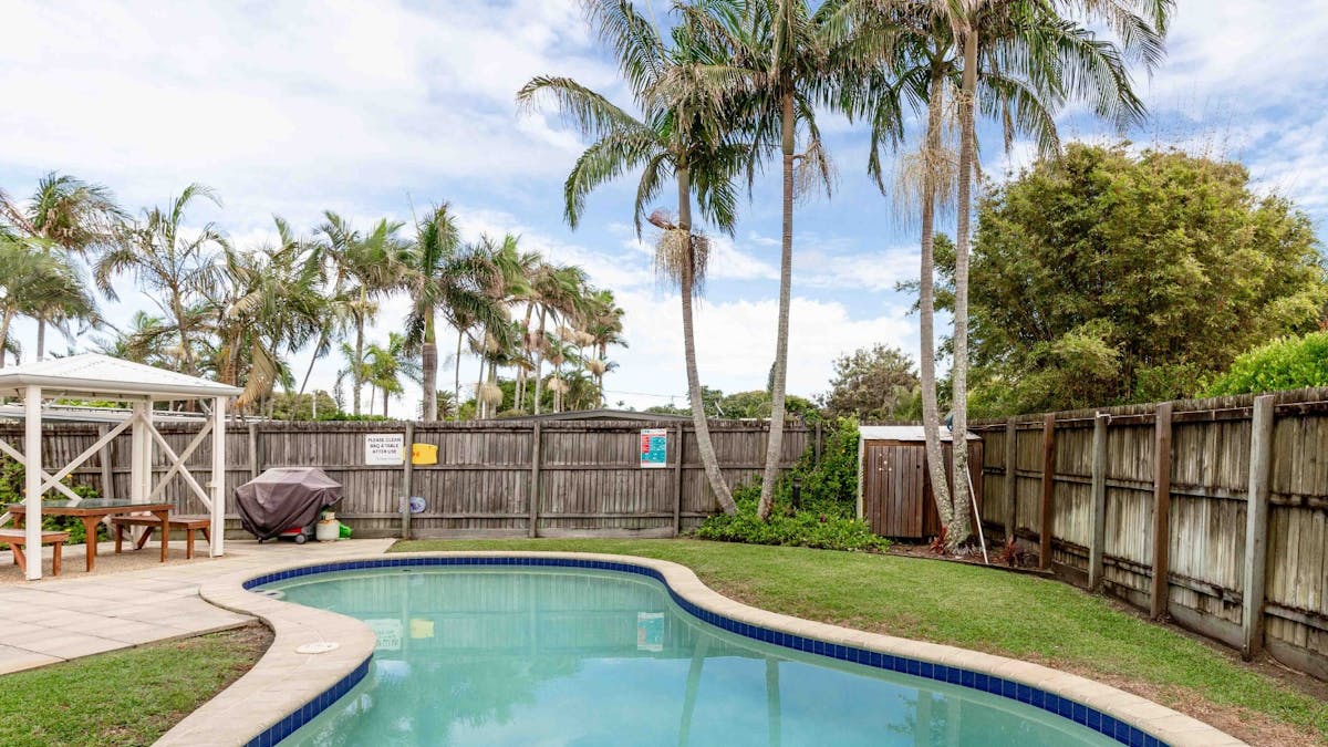 Shared pool with outdoor dining