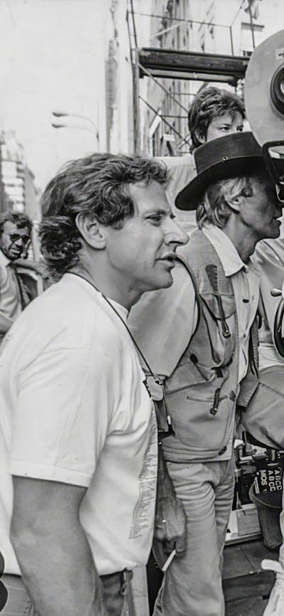 Black and white image of camera people all participating in shooting