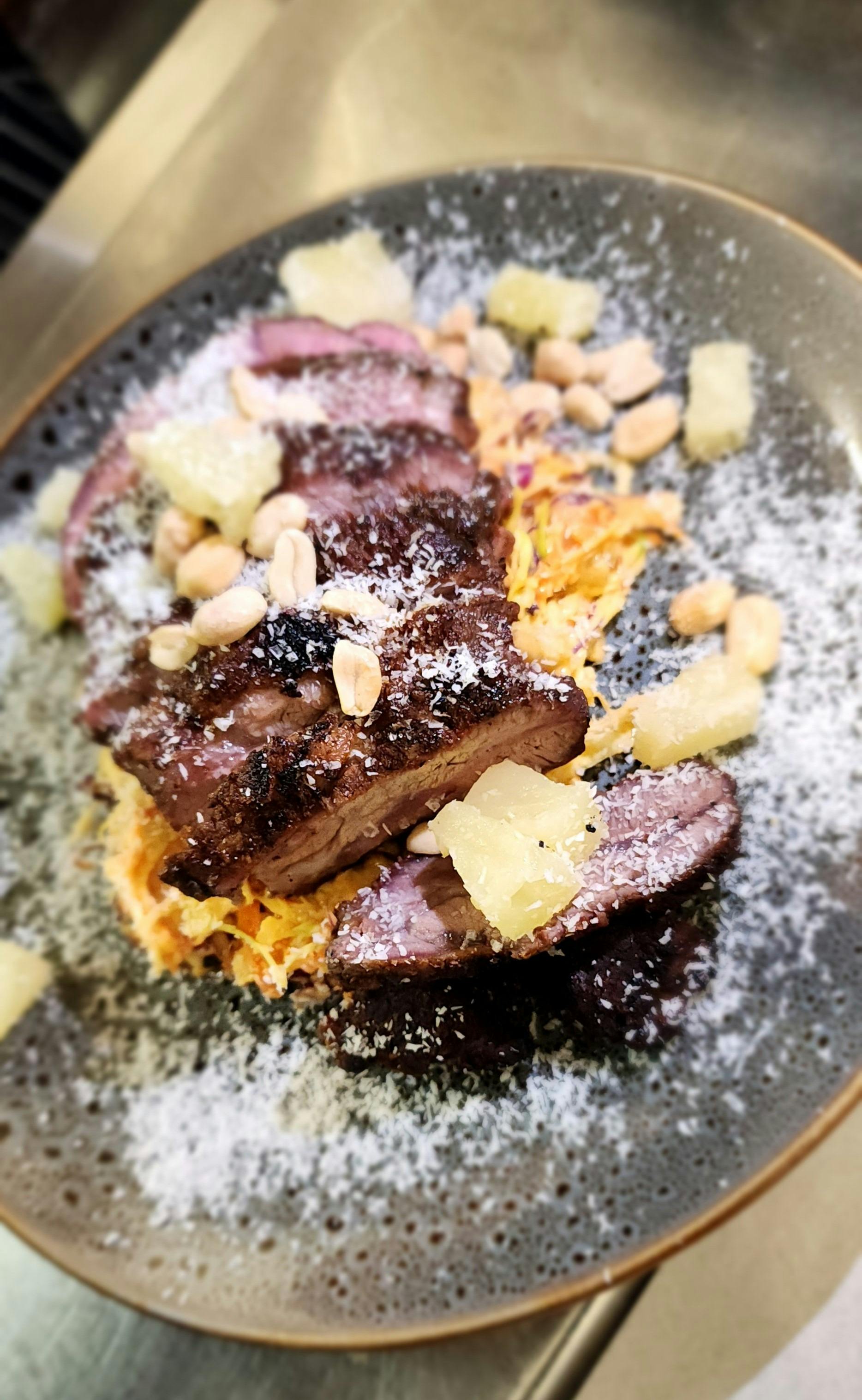 Chargrilled sirloin served on Asin coleslaw