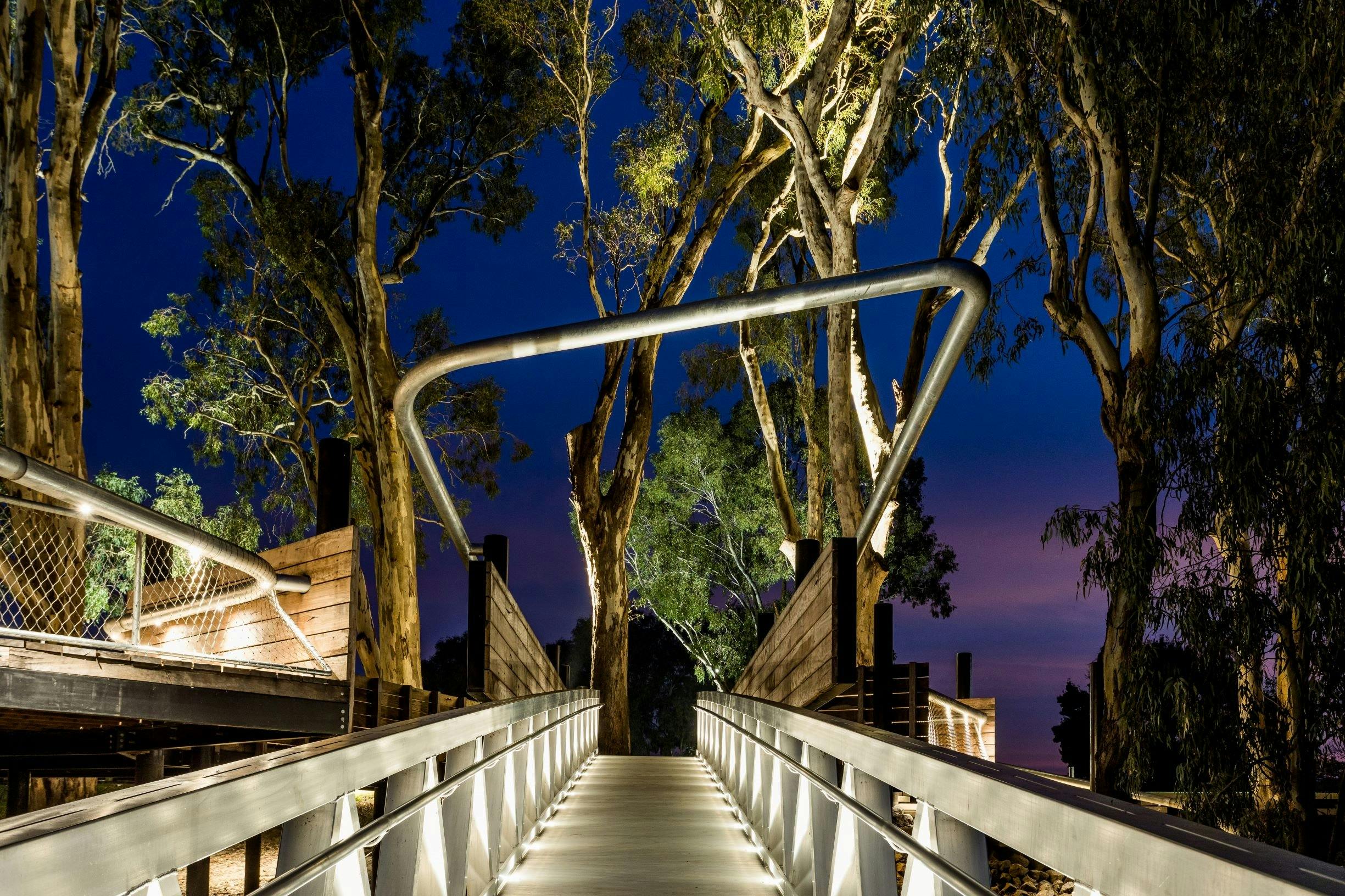 Looking up at the walkway of the Koondrook wharf at dusk