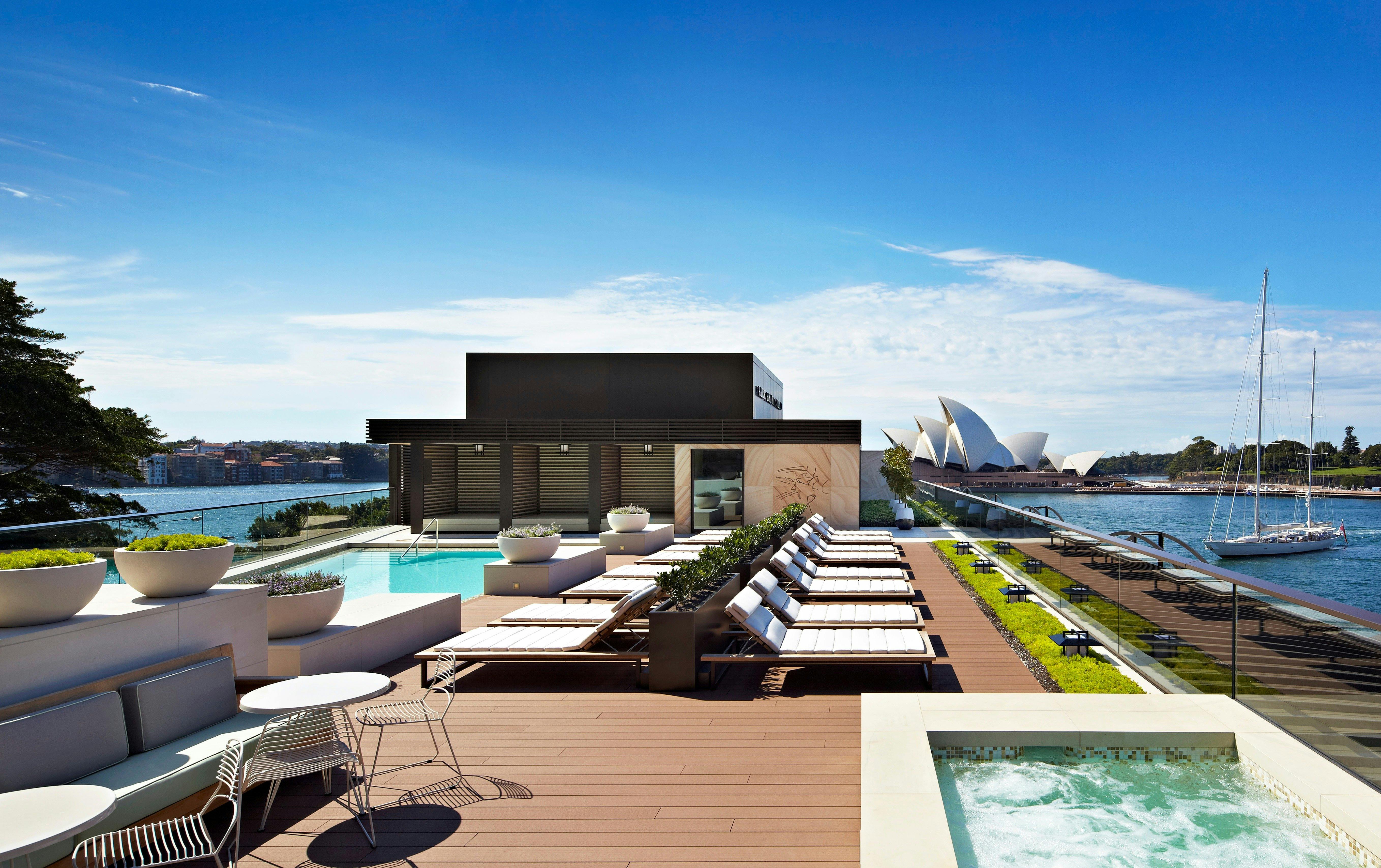View of Sydney Opera House and harbour from rooftop pool and terrace of Park Hyatt Sydney hotel