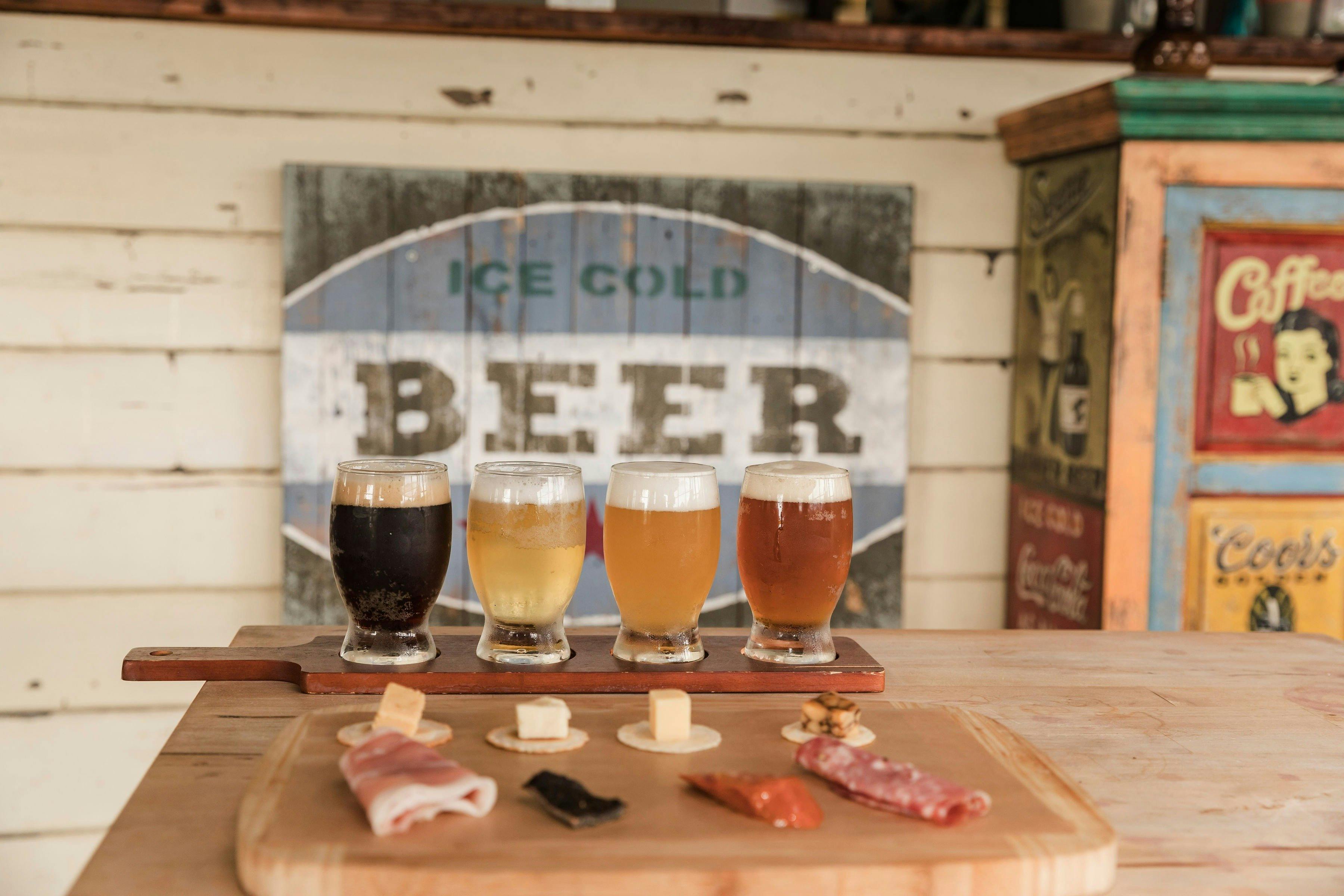 Beer tasting paddle and tasting plate on our Beer Belly Tour