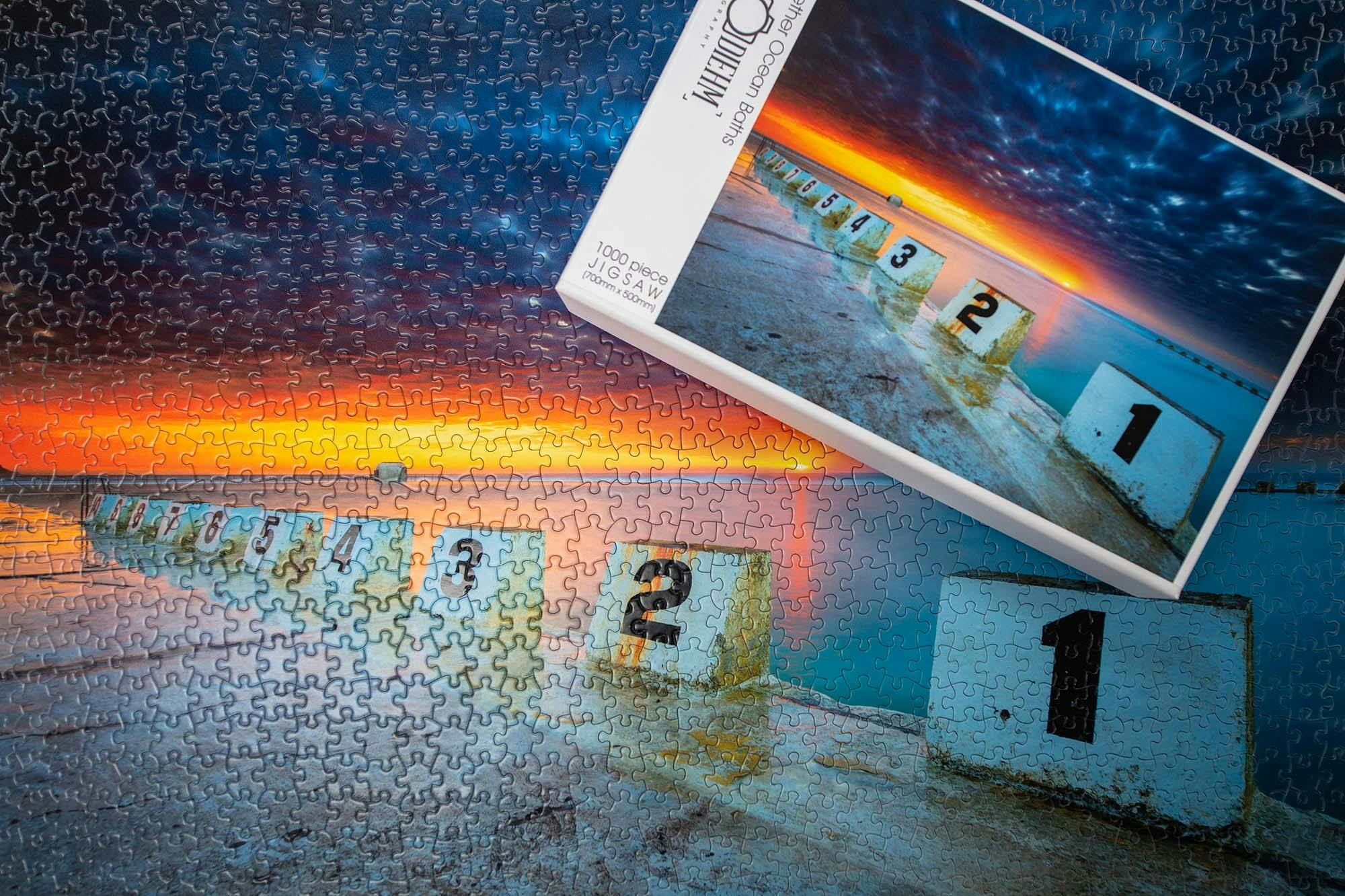 1000-piece puzzle featuring an aerial photograph of Merewether Ocean Baths in Newcastle with vivid b
