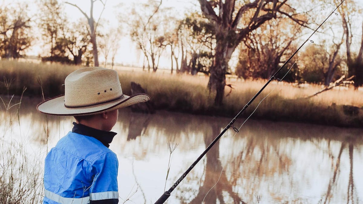 Young boy fishing in the Yelarbon Lagoon