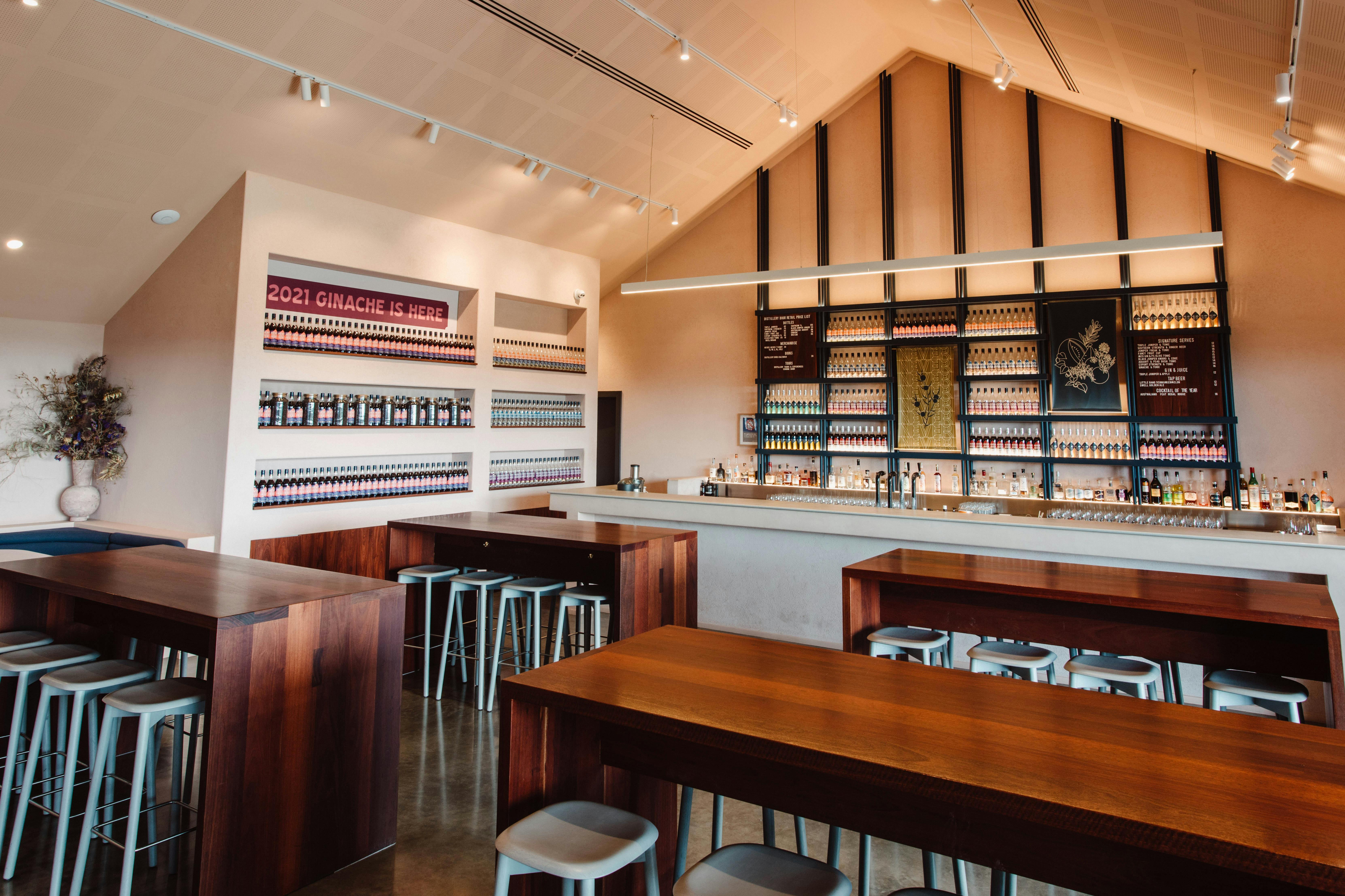 The interior of the Distillery Bar includes soft pink walls, touches of navy blue and Jarrah wood