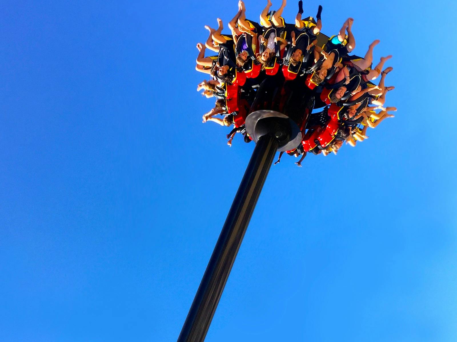 A big swinging circular pendulum ride swings 18m up in the air with 16 guests having fun