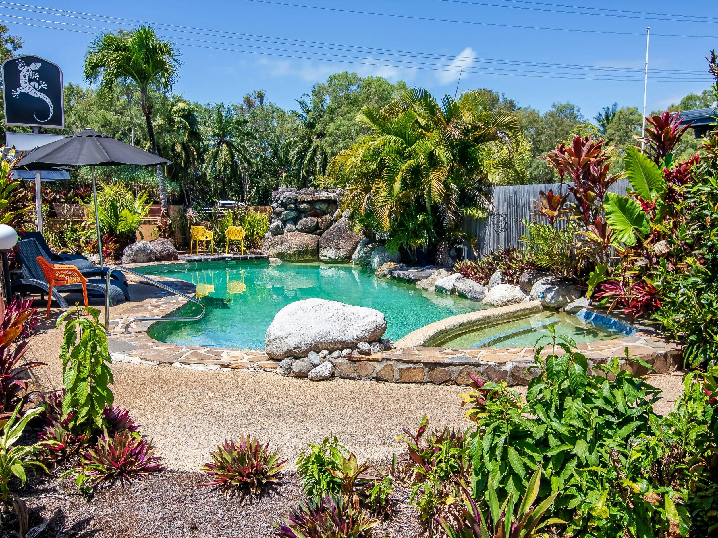 Heated pool in tropical gardens