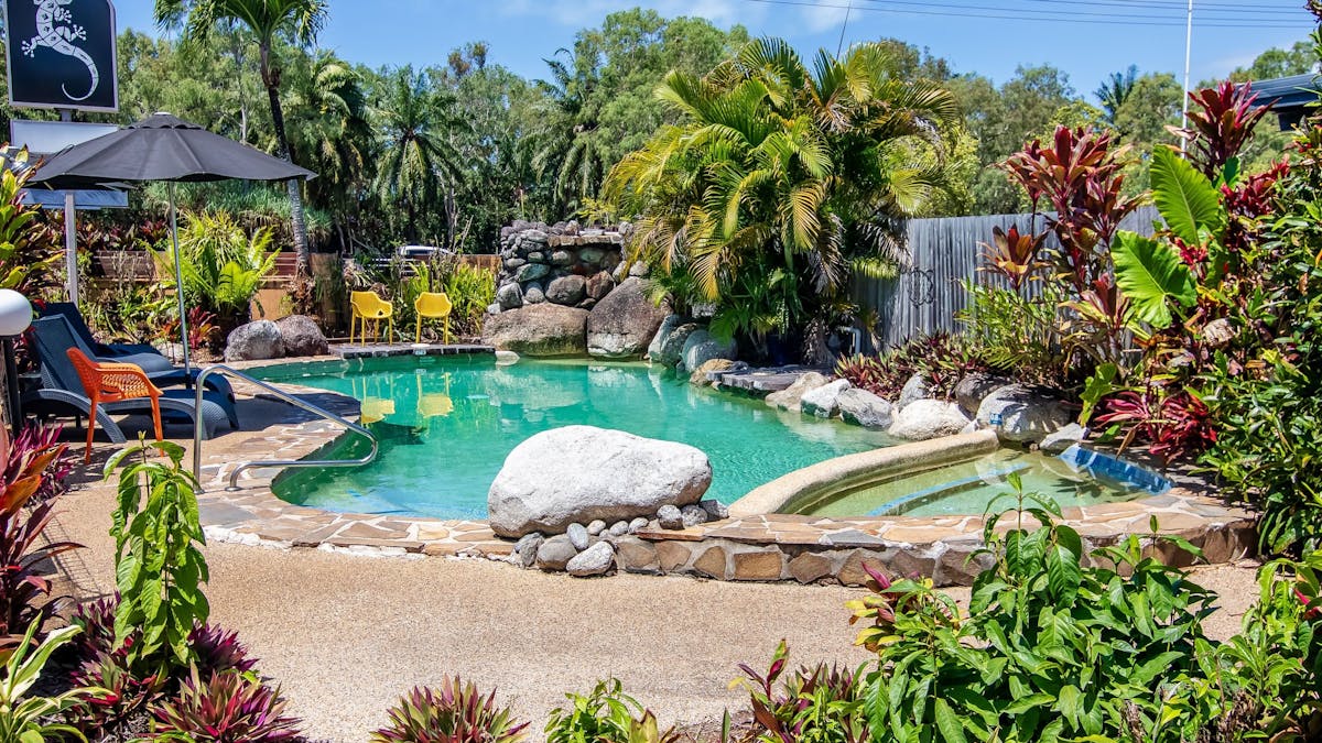 Heated pool in tropical gardens