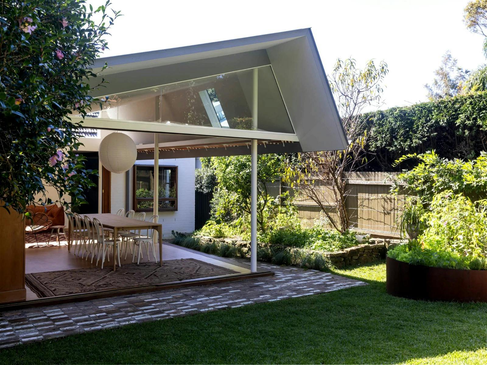 The back of the house is all about the kitchen, living, dining, and of course the garden