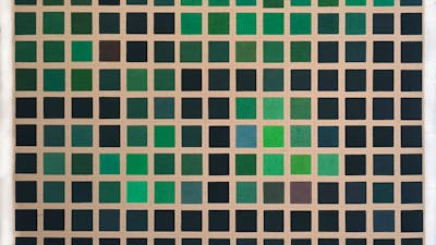 A painting depicting a grid of different shades of green squares on an unprimed canvas