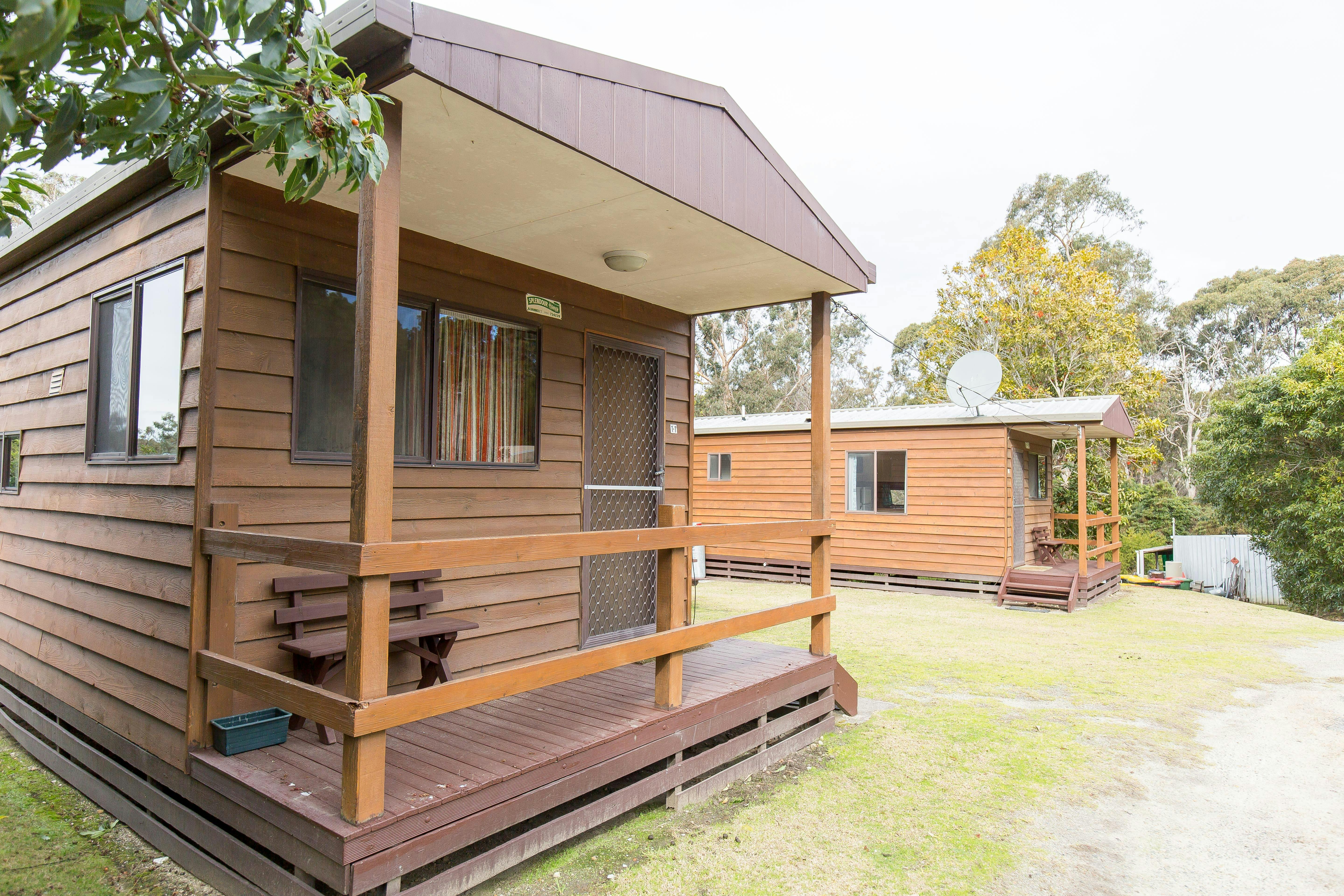 This is Cottage 11, it has a grassed area with BBQ anf fire pit. Great for those with dogs.